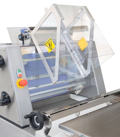 Moulding machine for bakeries with tiltable safety covers facilitates cleaning
